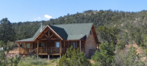 38 Acres with 920 sq-ft  Log Cabin